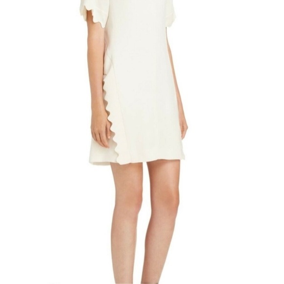 The Chloe‎ ivory dress is 100% authentic retails for $1895. - Picture 13 of 14